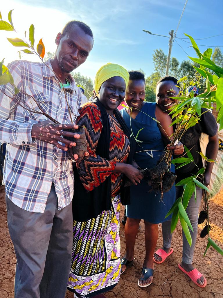 Beth Waithira (2nd left with a head turban) who has embarked on planting bamboo along drying rivers. Photo/ Milliam MurigiNairobi