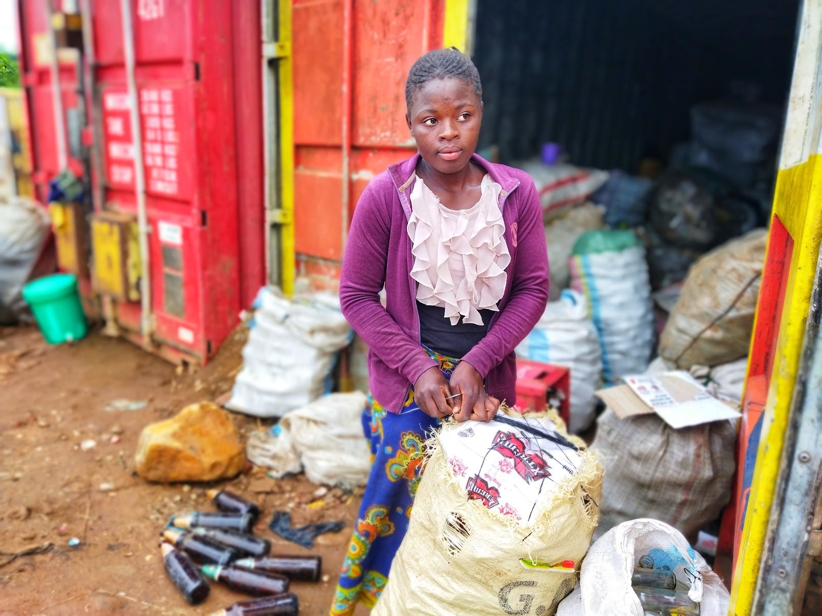 Aisha Mdeza packing bottles into bags of 200 which are sold at around MK 8,000 ($10). Photo/ Florence Mwale