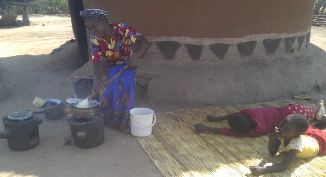 A woman preparing meal for her family using tsotso energy-saving stove. Photo/Rutendo Chirume/AWiM