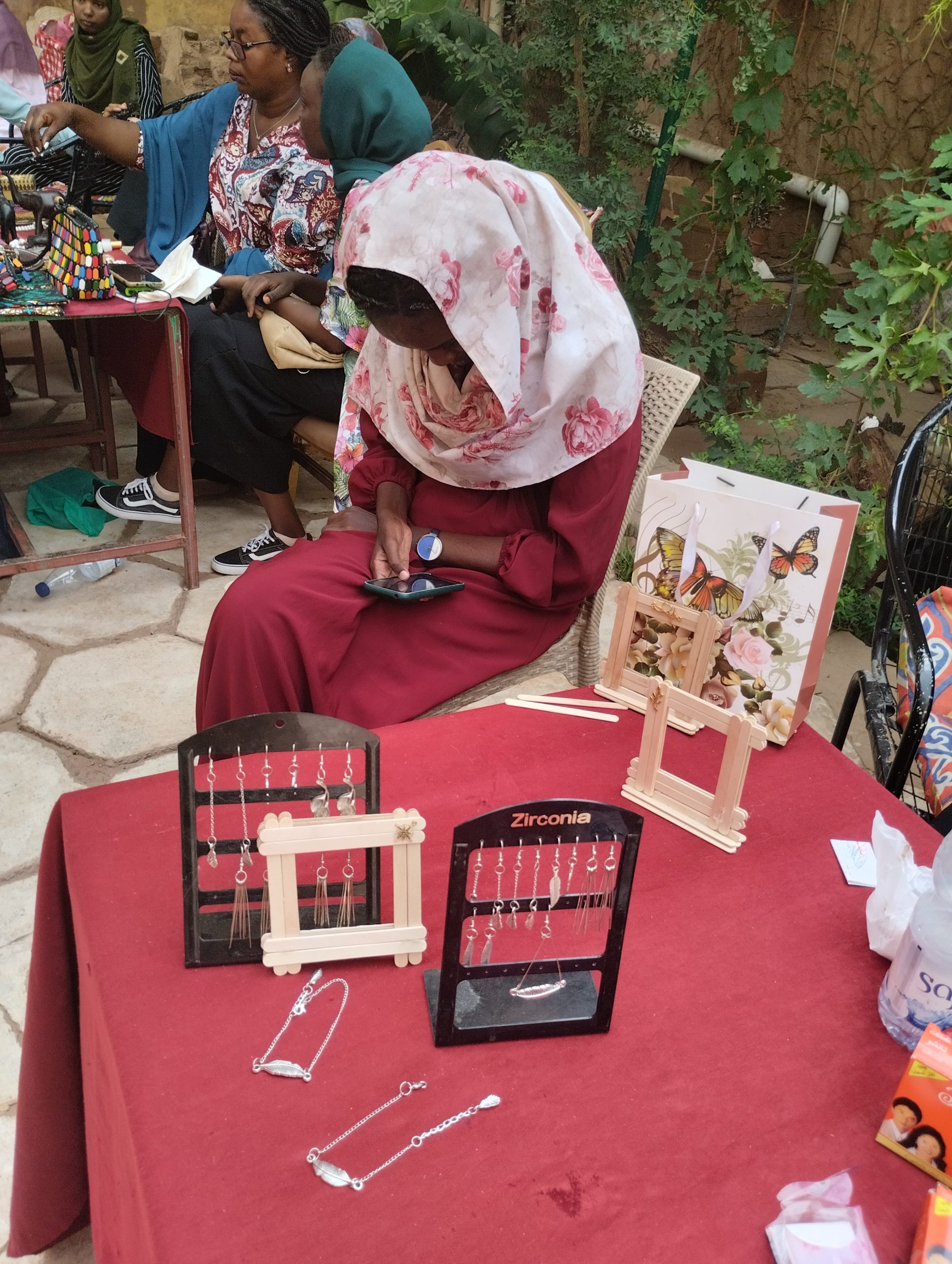 Women selling pieces made from wood. Photo/Eslam Abuelgasim/AWiM